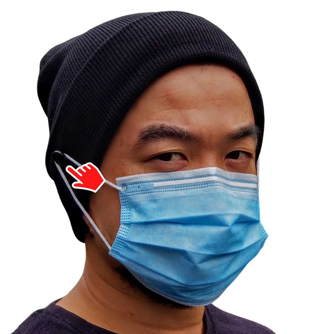 Person wearing a blue surgical mask with a red hand icon on a white background