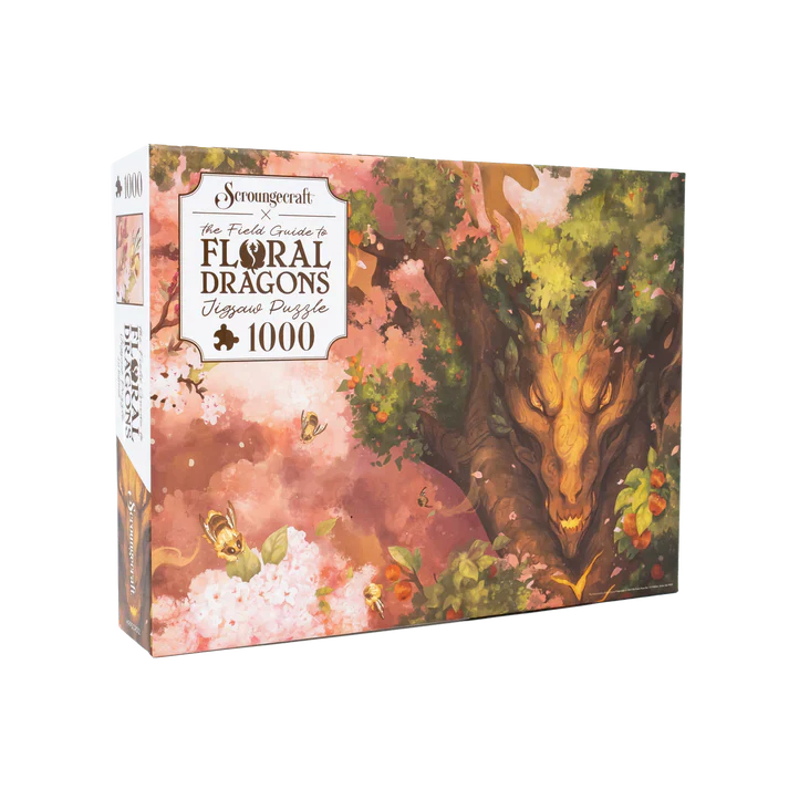 Jigsaw puzzle box featuring a dragon in a floral setting with 'Strangewerk' branding.