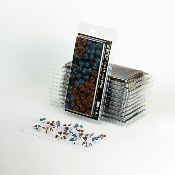 Packaged floral embellishments with a clear display on a white background