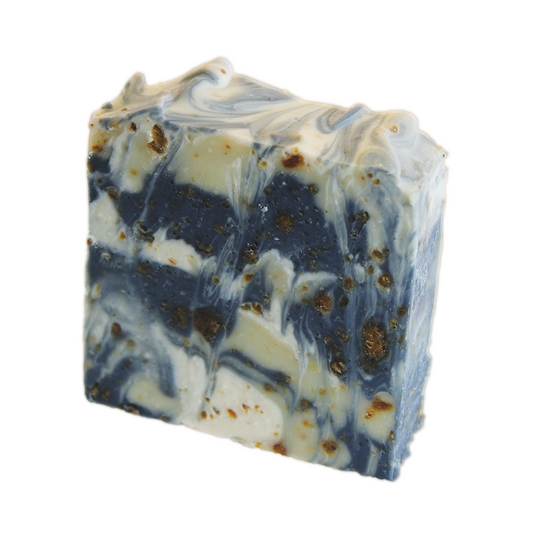 Marbled soap bar with blue and white pattern on a white background
