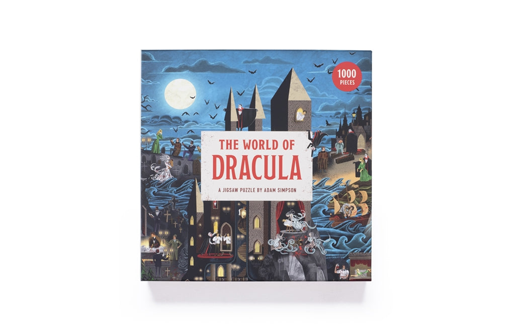 Jigsaw puzzle box titled 'The World of Dracula' with a castle and moon design on a white background.