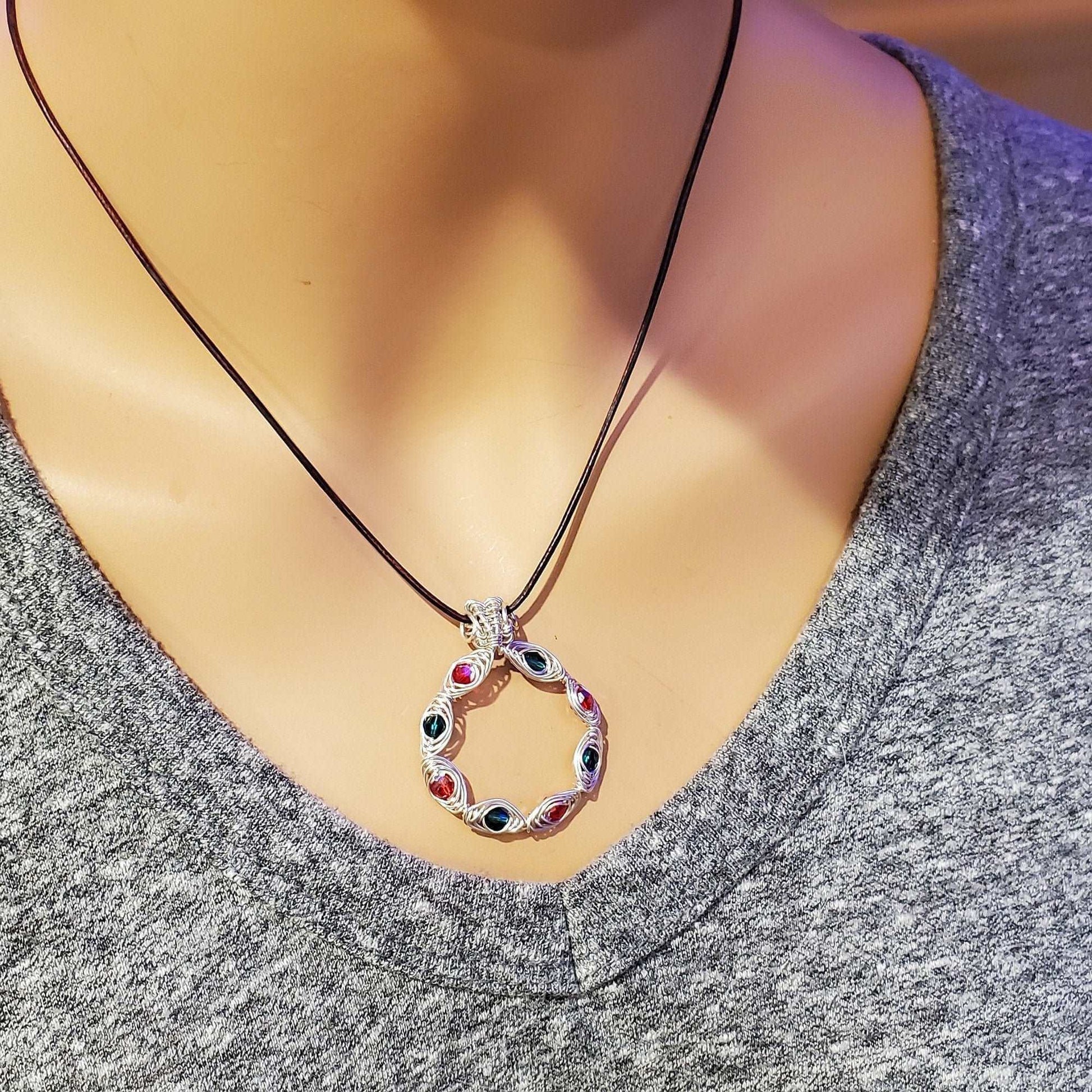 Necklace with a colorful pendant on a mannequin