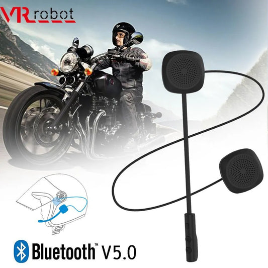 Motorcycle helmet with built-in Bluetooth communication system on a motorcycle against a mountainous background.