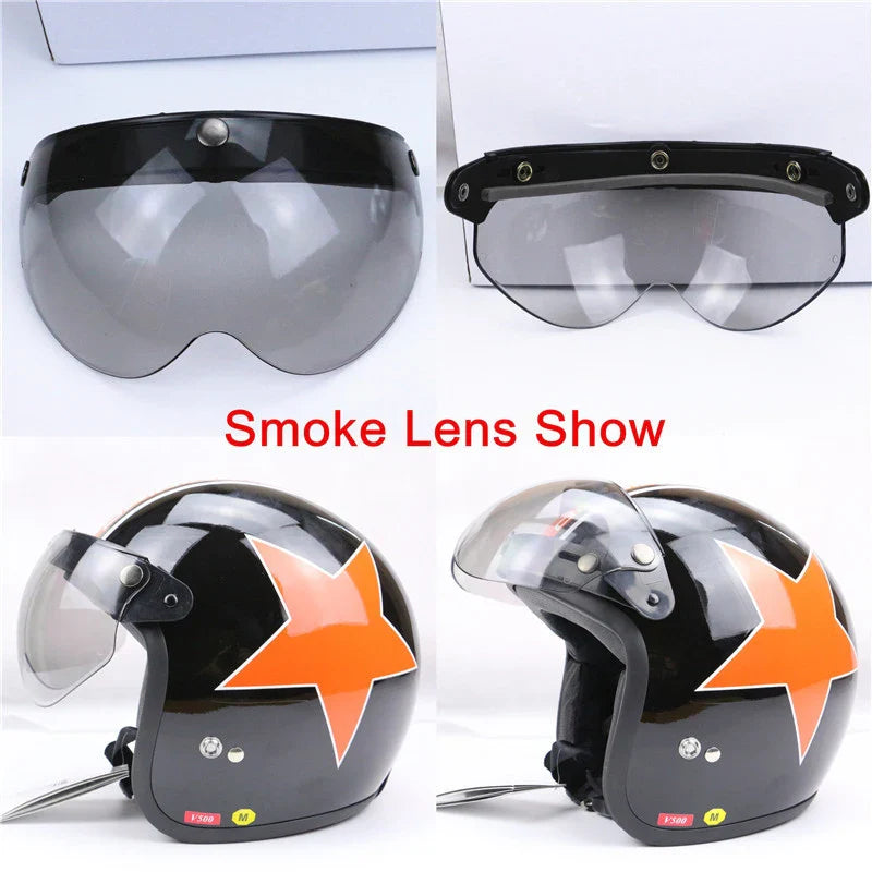 Motorcycle helmet with smoke lens and orange star design on a white background