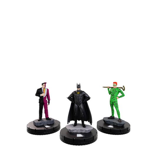 Three superhero action figures on stands against a white background