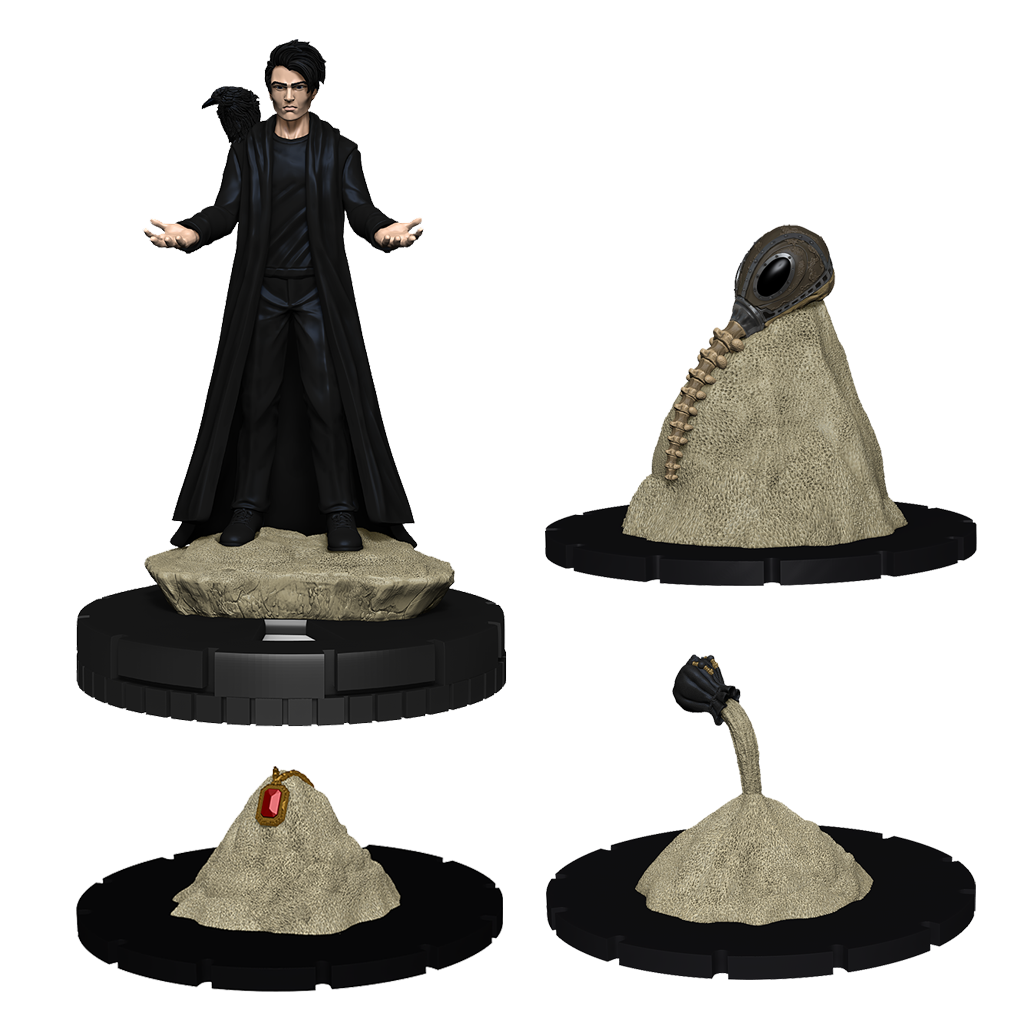 Collection of fantasy figurines including a character in a black robe and three creature heads on stands.