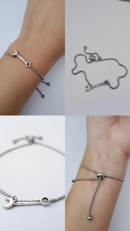 Silver bracelet with a unique design on a white background