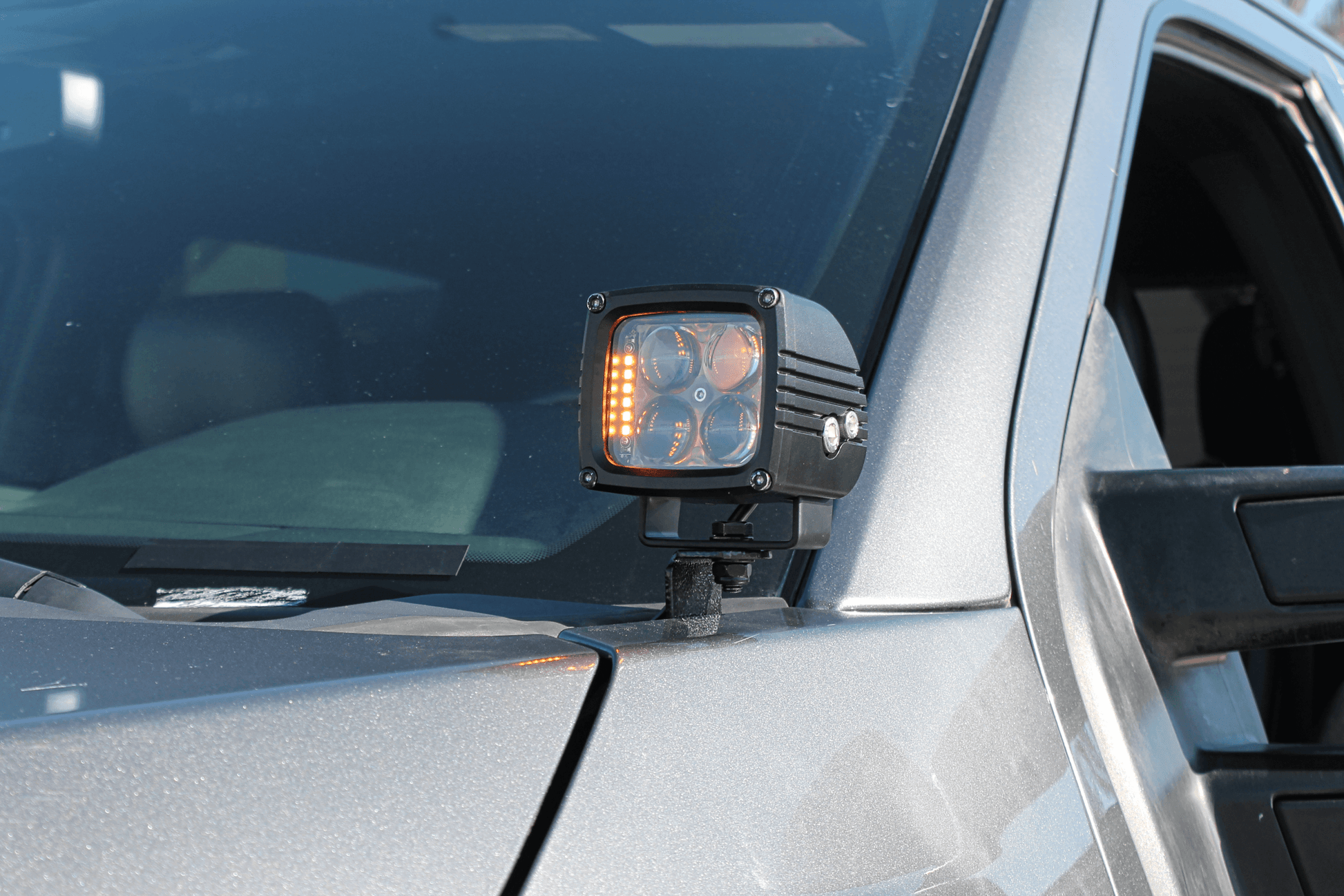 Car side mirror with an additional LED light attached