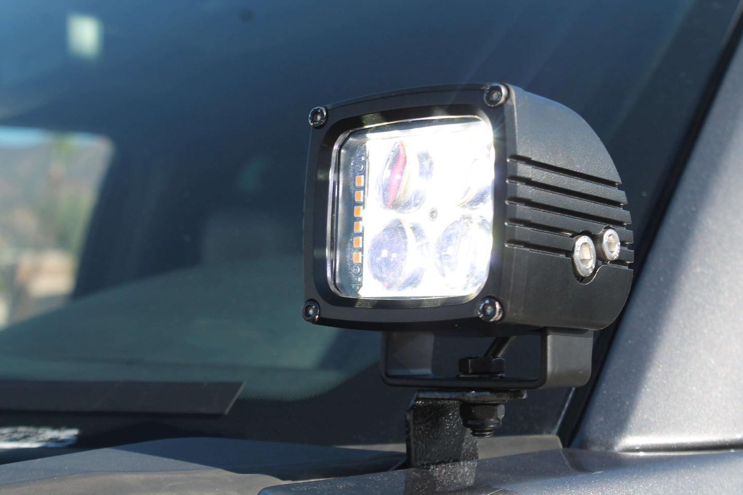 LED work light mounted on a vehicle
