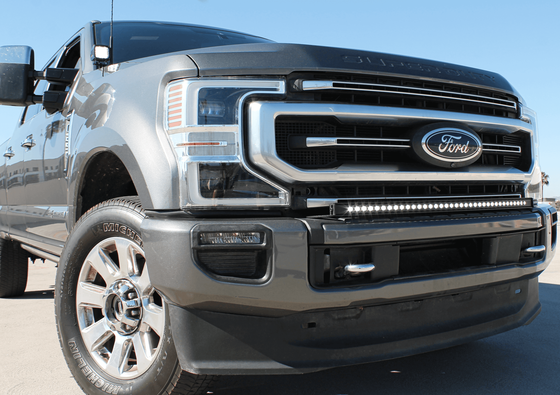 Ford truck with clear blue sky background LED Light Strip and Mounted Hood Light