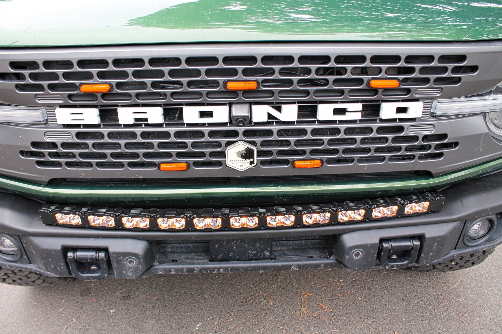 Close-up of a Ford Bronco grille with visible branding and Light Bar.