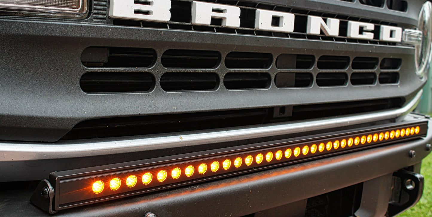 Close-up of a Ford Bronco grille with LED light bar