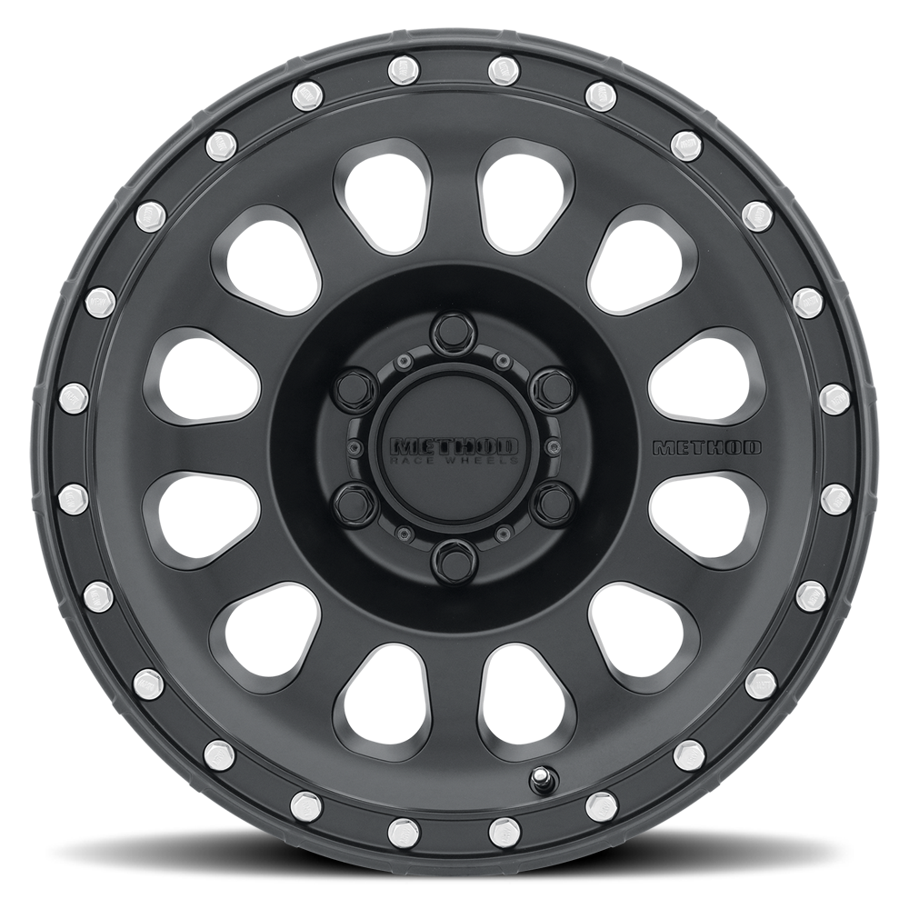Black alloy wheel with white accents on a white background