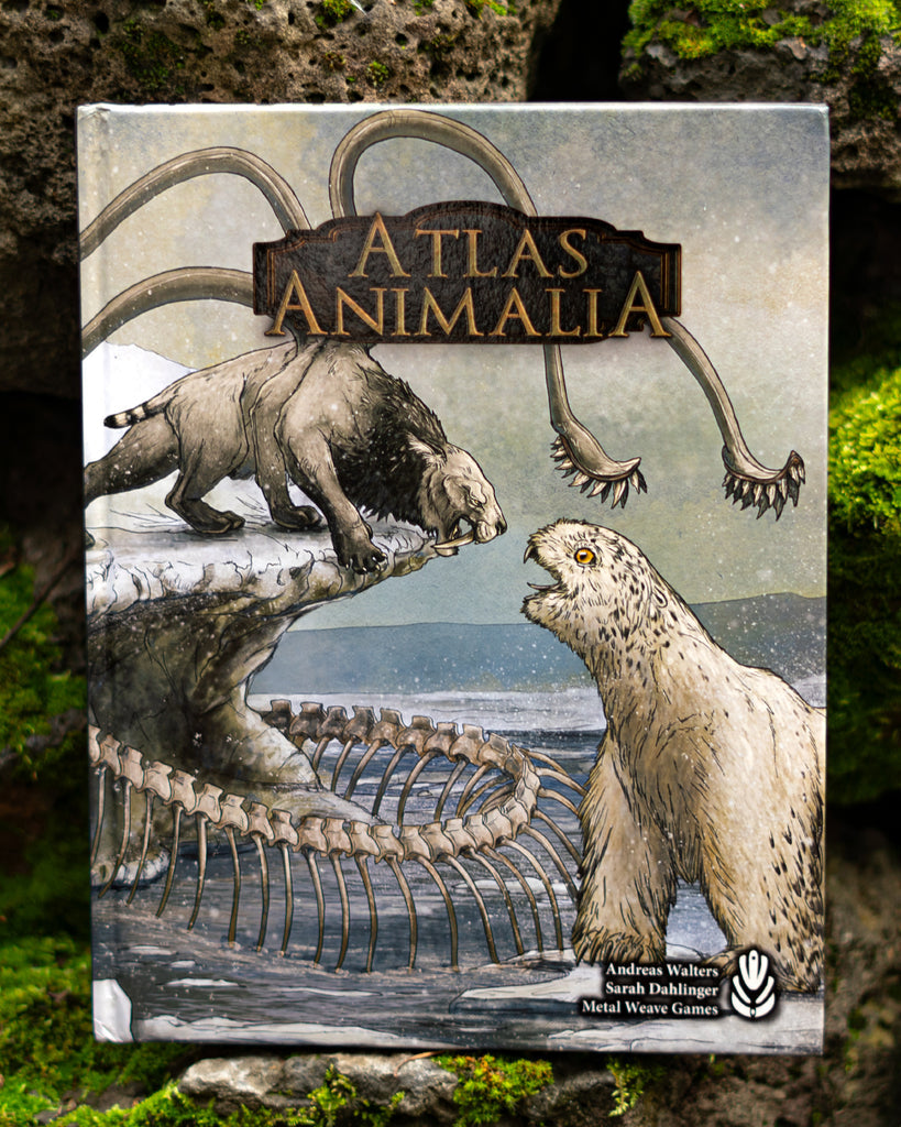 Book titled 'Atlas Animalia' with illustrations of animals and a skeleton on a natural background