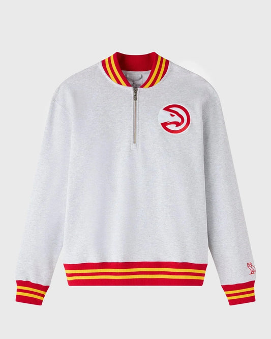 Gray jacket with red and yellow accents and ATlanta Hawks logo on a white background