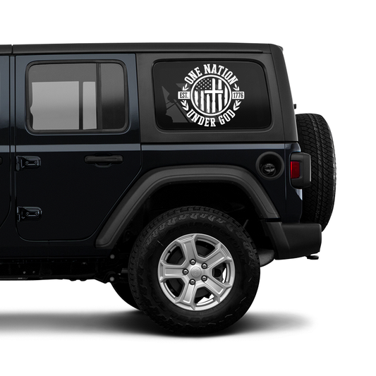 Black Jeep with a decal on the back window featuring text and an American flag.