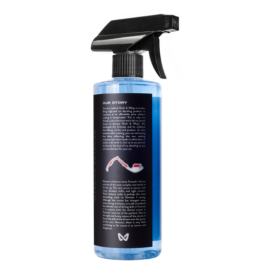 Spray bottle with black nozzle and blue label on a white background