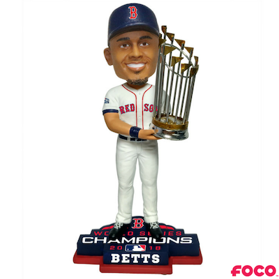 Bobblehead of a red sox baseball player holding a trophy with 'FOCO' branding on a white background