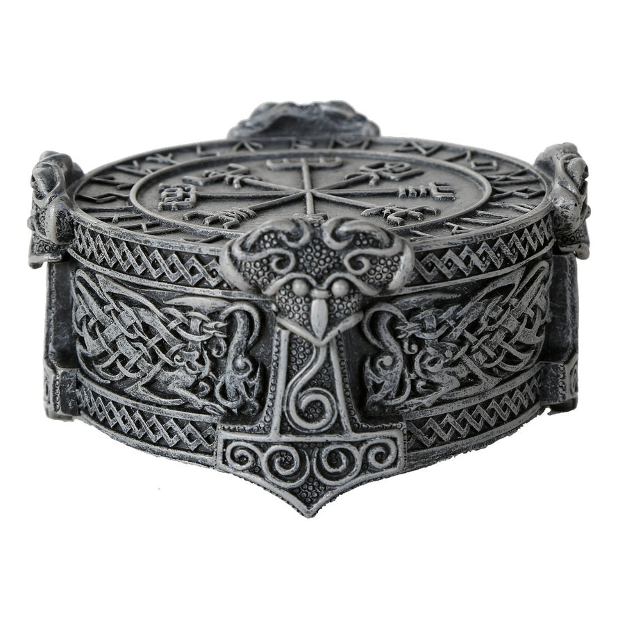 Decorative box with intricate designs on a white background