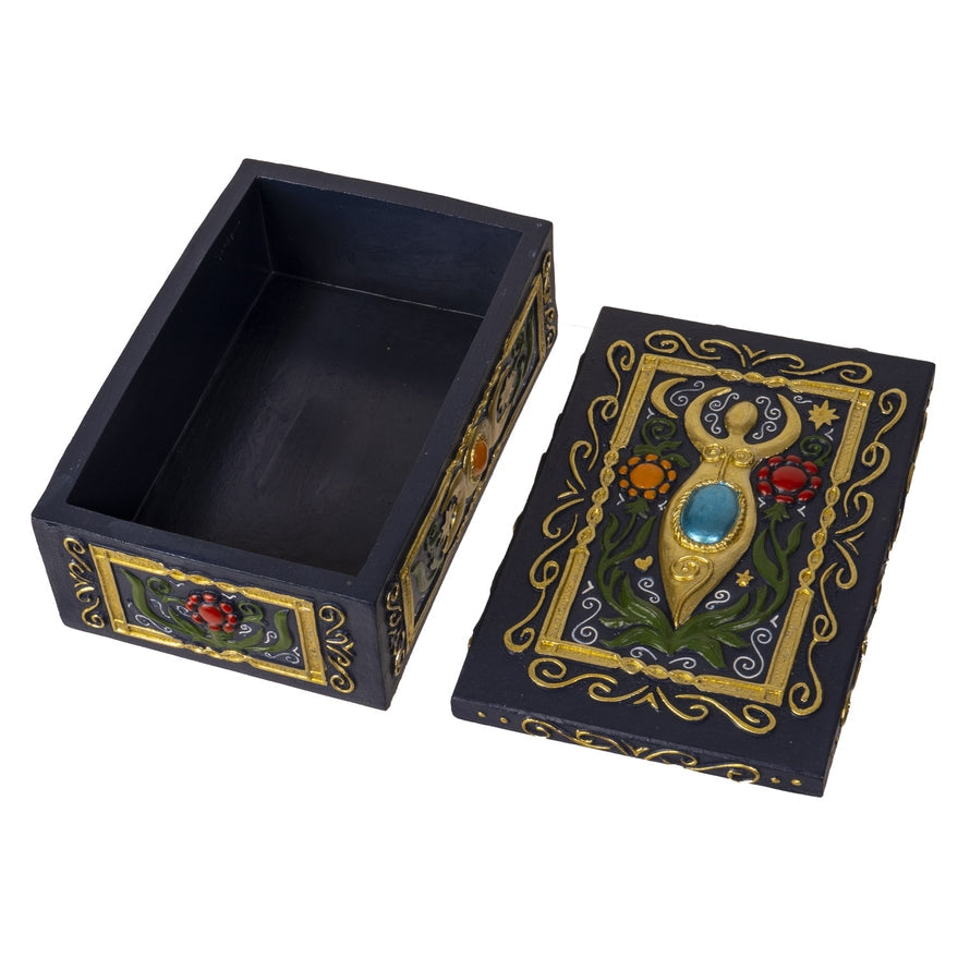 Decorative black box with gold and colorful designs on a white background