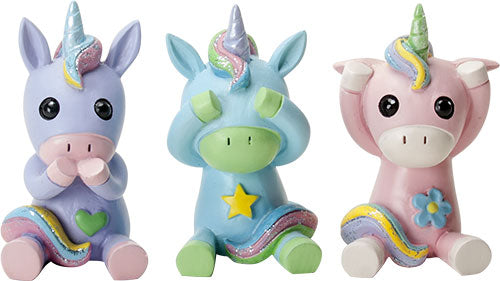 Three colorful unicorn figurines with rainbow hair and different colored bodies.