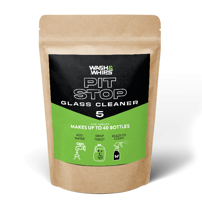 Pit Stop Glass Cleaner packaging with brown kraft paper sleeve on a white background