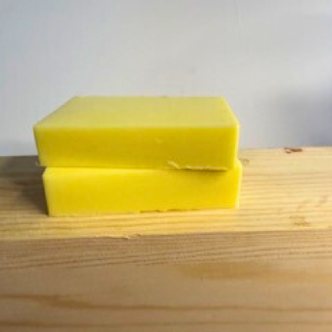 Lemon Zest- Lemon Scented Handmade Soap rectangular blocks on a wooden surface with a light gray background