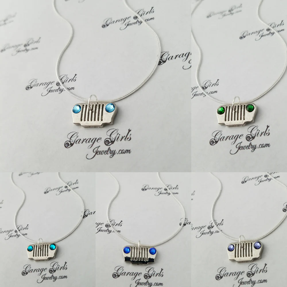 Collage of necklaces with grill pendants on a 'Garage Girls Jewelry' branded card.