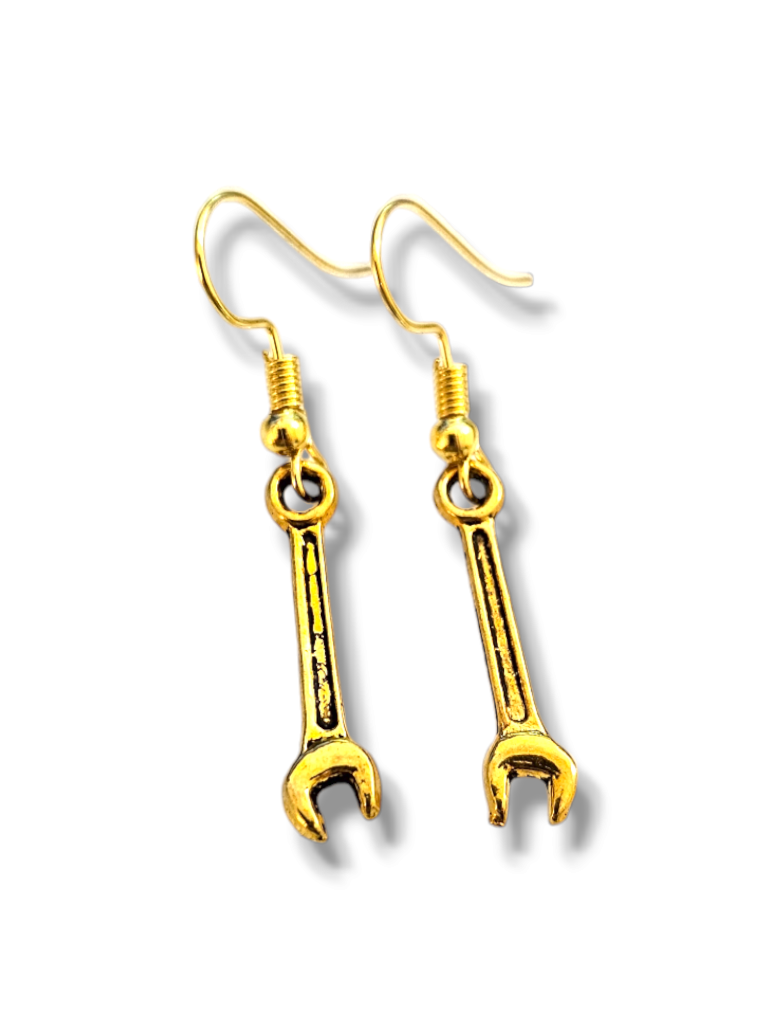 Gold wrench-shaped earrings on a white background