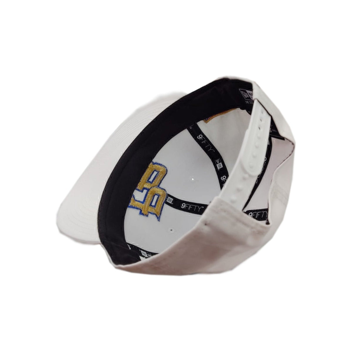 White baseball cap with black brim and logo on a white background