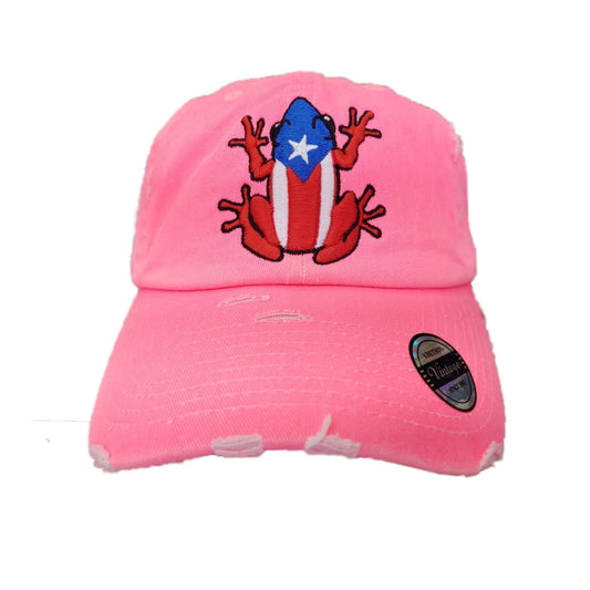 Pink cap with a coqui frog design featuring the Puerto Rican flag on a white background