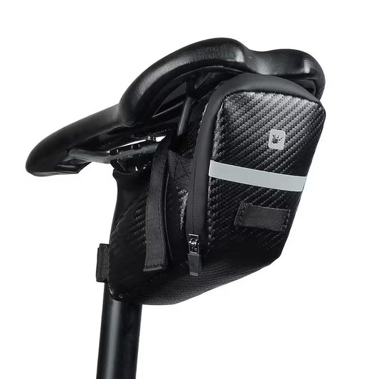 Black bicycle saddle with carbon fiber patterned bag on a white background