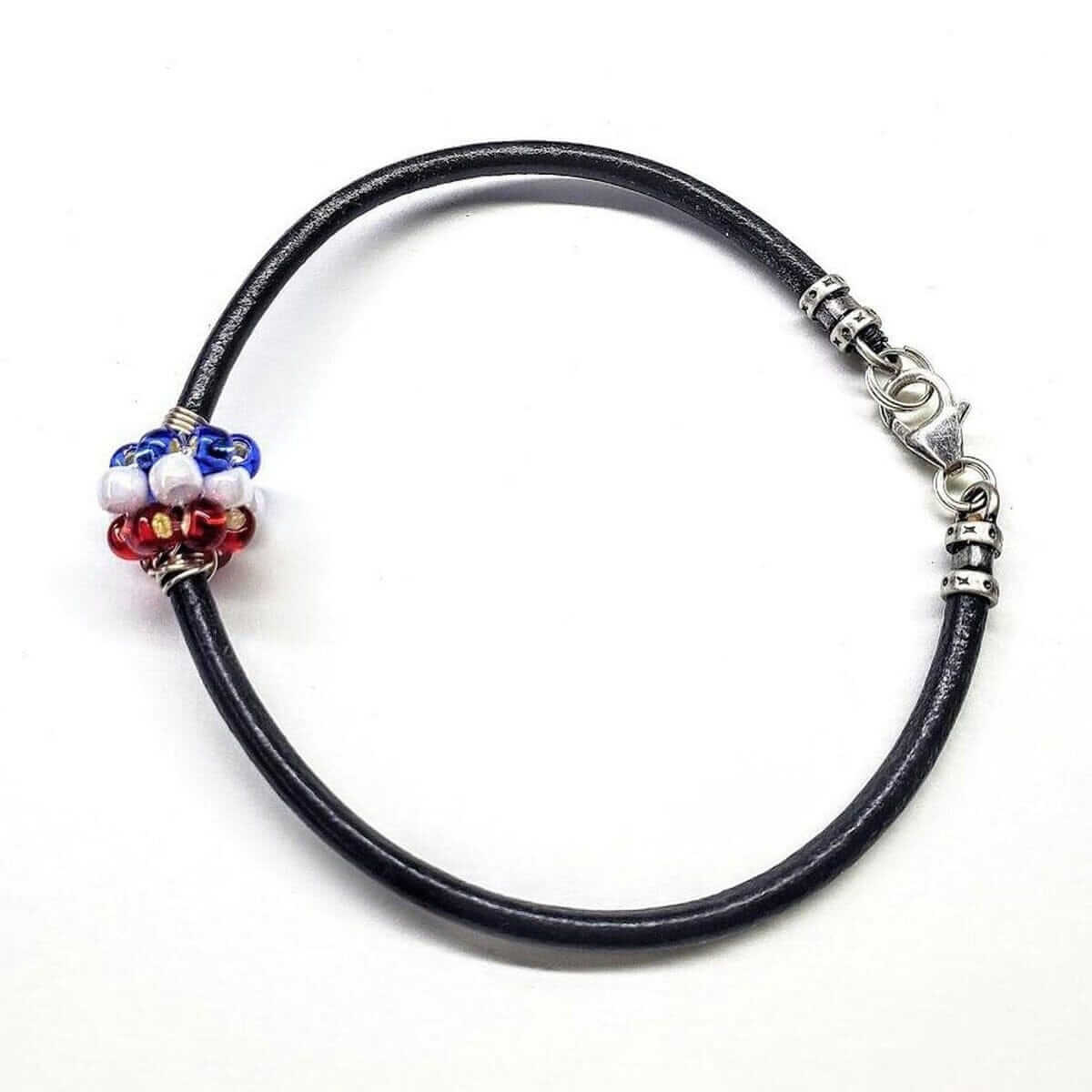 Black leather bracelet with colorful beads on a white background