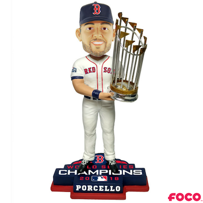 Bobblehead of a red sox baseball player holding a trophy with 'FOCO' branding on a white background