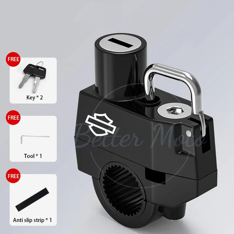 Black motorcycle lock with keys and tool on a gray background