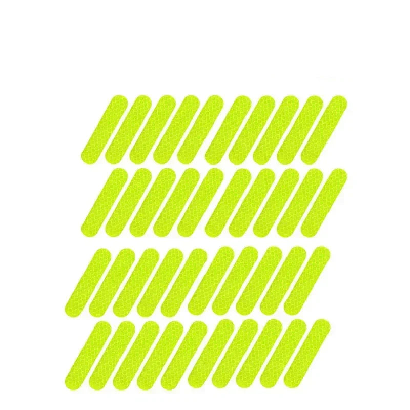 Multiple bright green rectangular stickers on a white background