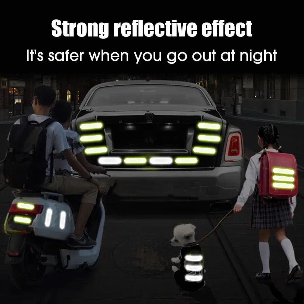 Car with reflective strips on the back, children with backpacks, and a dog on a leash in a dark setting.