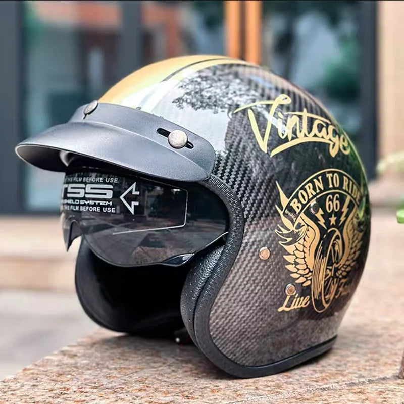 Motorcycle helmet with 'Vintage' and 'Born to Ride' text on a blurred background