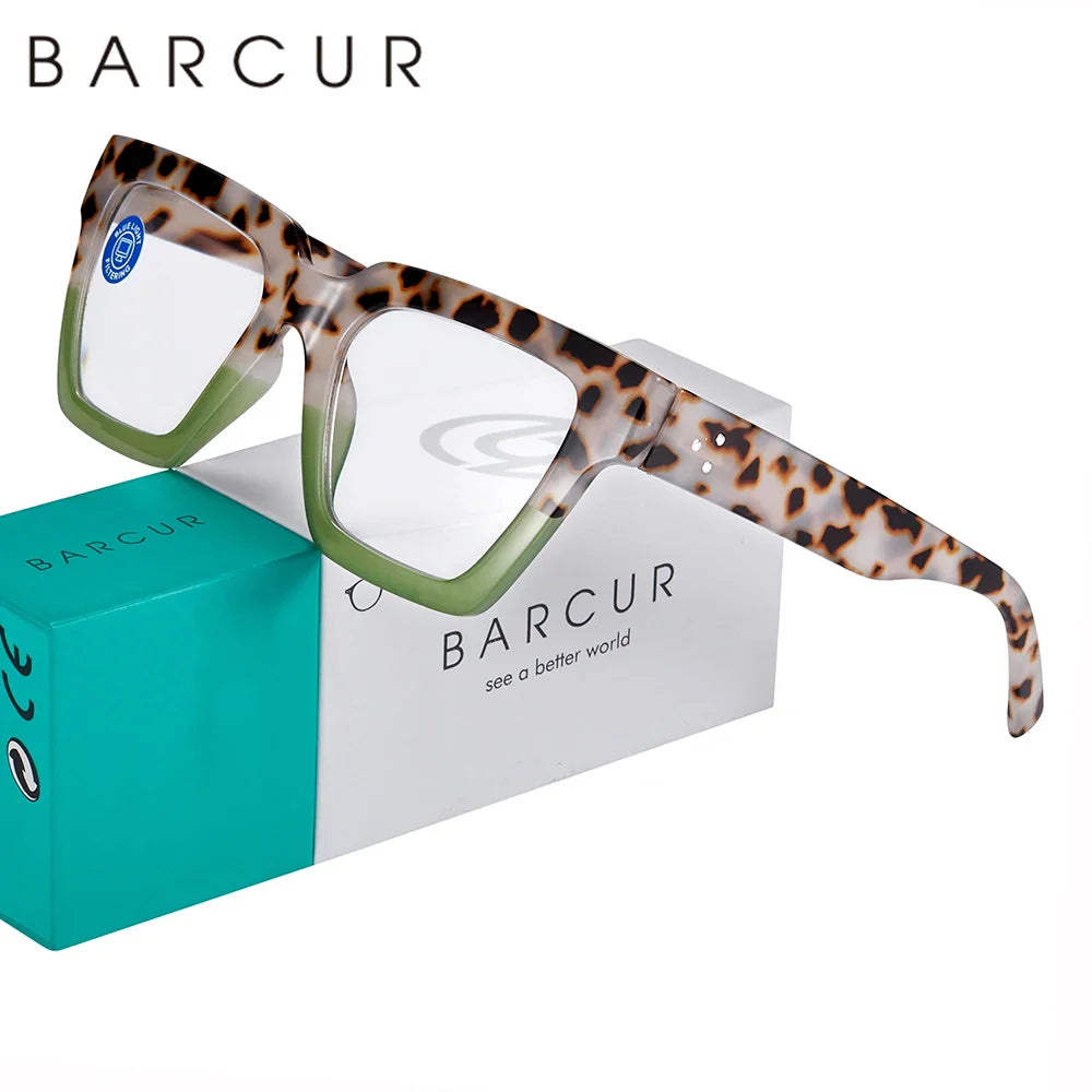 Leopard print eyeglasses with green lenses on a BARCUR branded box.