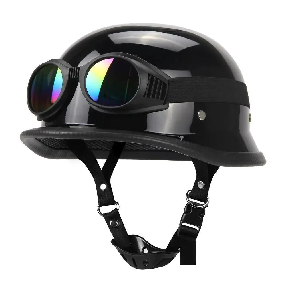 Black motorcycle helmet with goggles on a white background