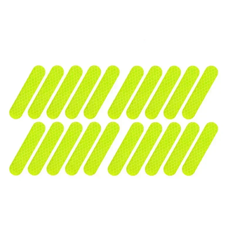 Set of reflective green strips arranged in a grid on a white background