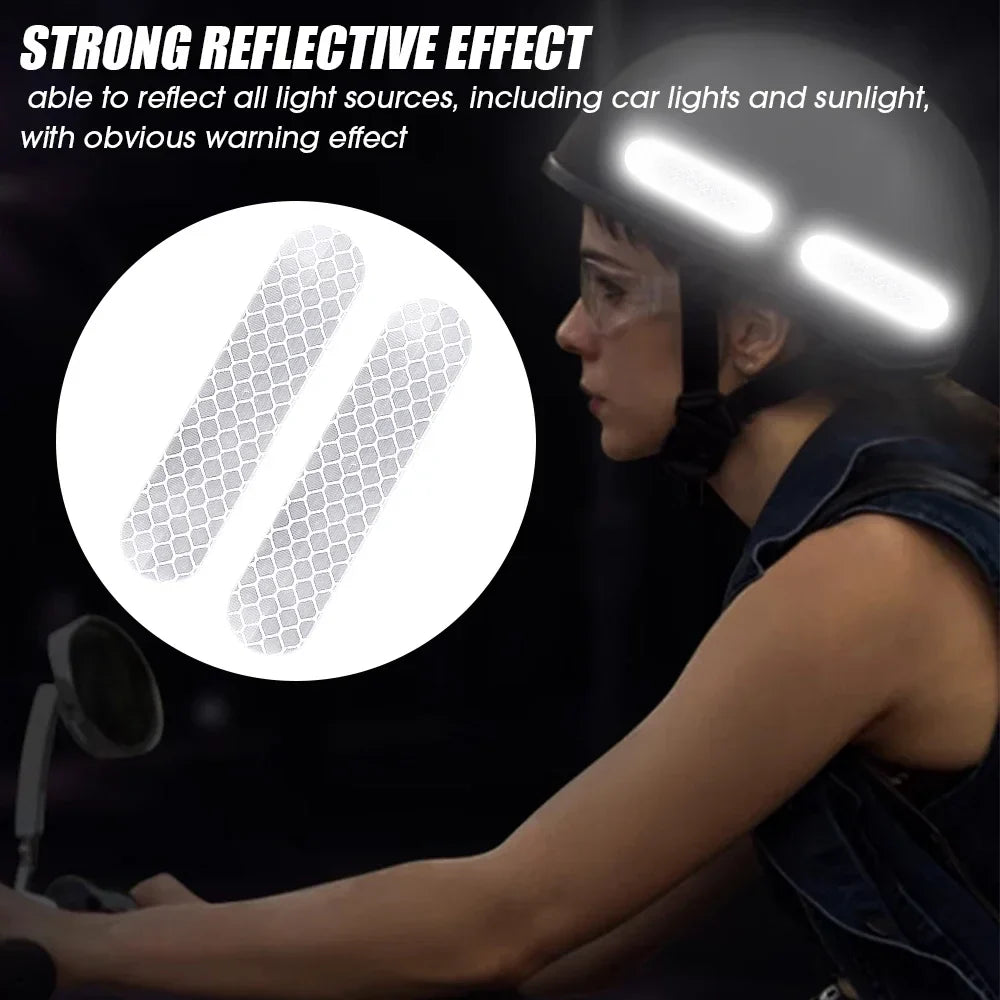 Person wearing a helmet with reflective stripes, highlighting its ability to reflect light sources.