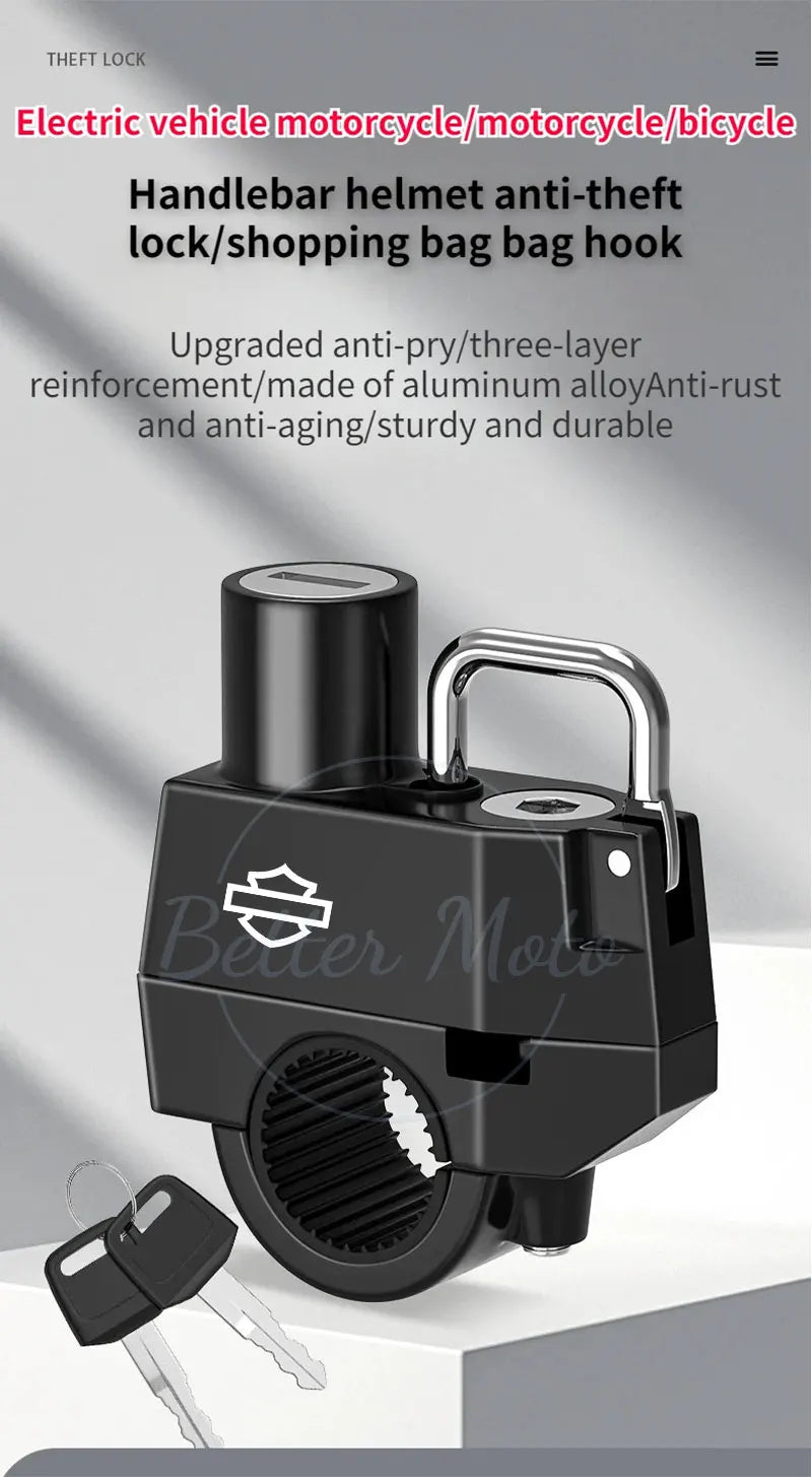 Black handlebar helmet anti-theft lock with keys on a gray background