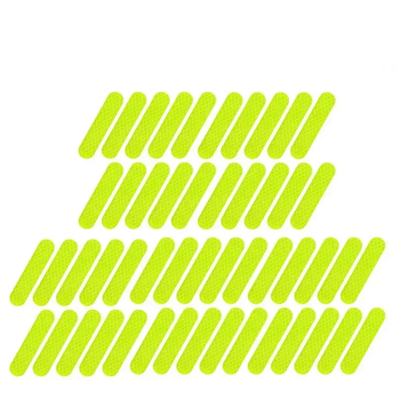 Multiple bright green rectangular labels arranged in rows on a white background