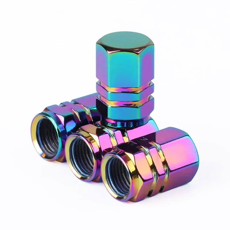 Multicolored valve stem caps on a white background