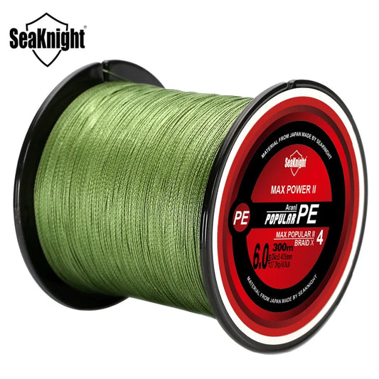 Spool of green fishing line with red label on a white background, featuring the Seaknight brand.
