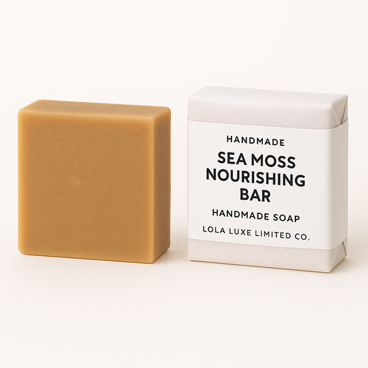 Handmade sea moss nourishing bar soap next to its packaging on a white background
