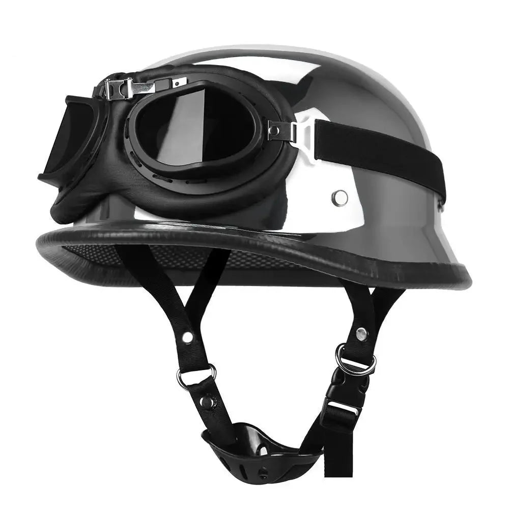 Black helmet with visor and chin strap on a white background