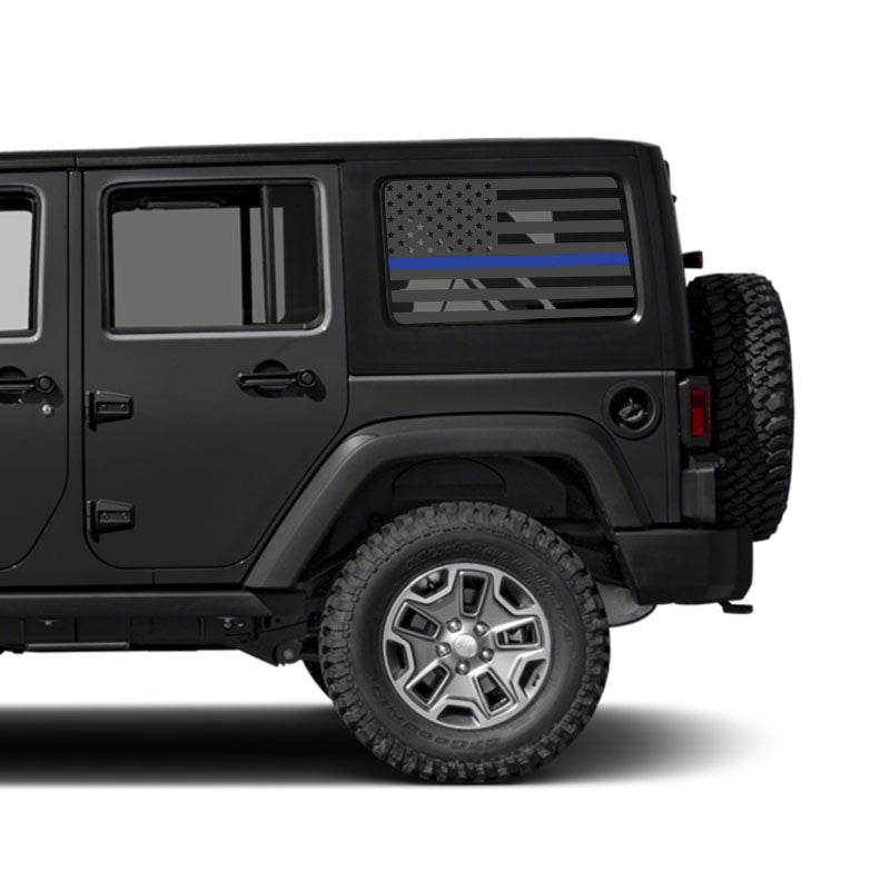 Black off-road vehicle with a Thin Blue Line American flag decal on a white background