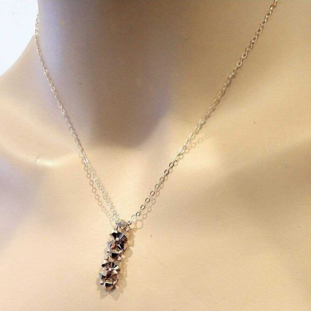 Necklace with a pendant on a mannequin neck